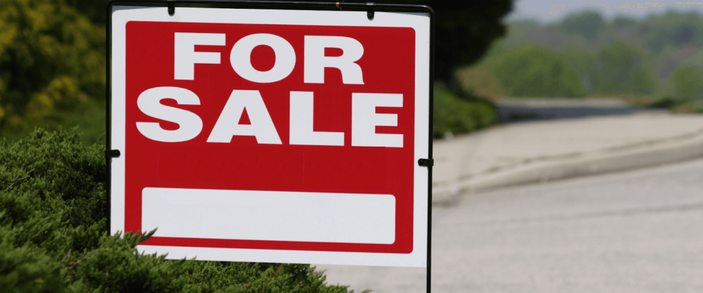 for sale sign for real estate property house